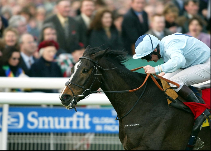 Dean Gallagher steers Hors La Loi III home in the 2002 Smurfit Champion Hurdle