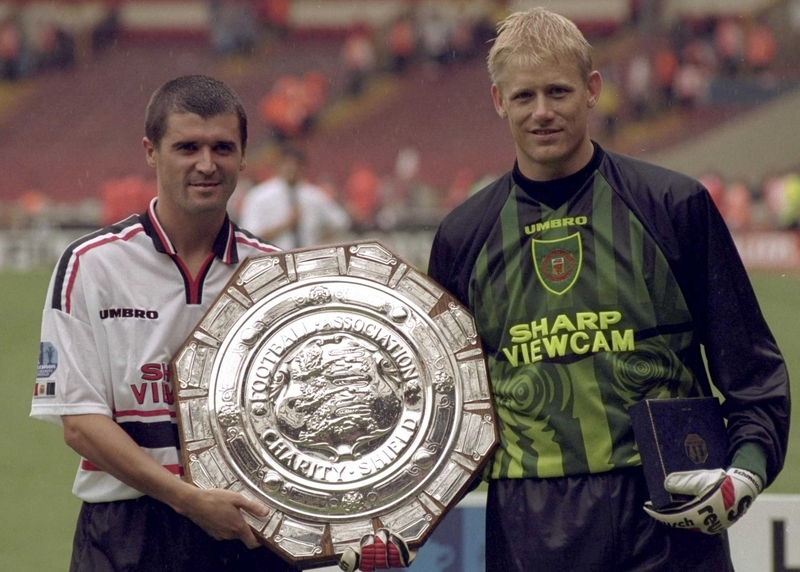 Roy Keane and Peter Schmeichel toast a Charity Shield victory for United during the Corkman's trophy-laden 12 years at the club