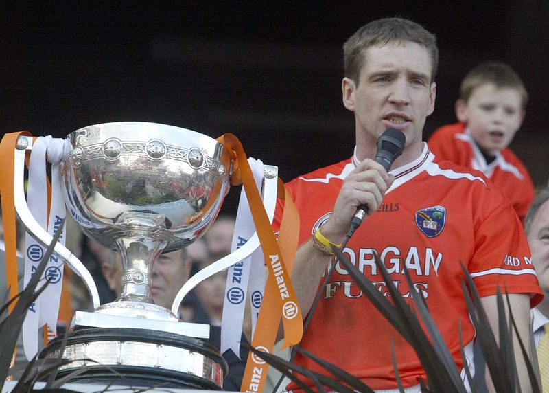 Armagh captain Kieran McGeeney makes a speech after receiving last year's League Cup