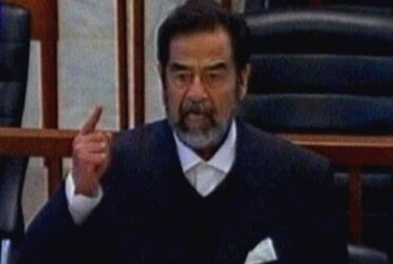 Saddam Hussein - Formal start to defence