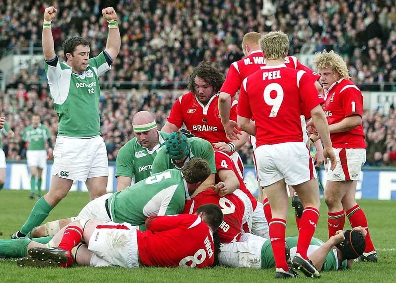 Marcus Horan holds his hands aloft as David Wallace went over for Ireland's first try at Lansdowne Road this afternoon