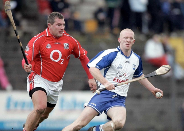 John Mullane breaks away from Cork's Diarmuid O'Sullivan