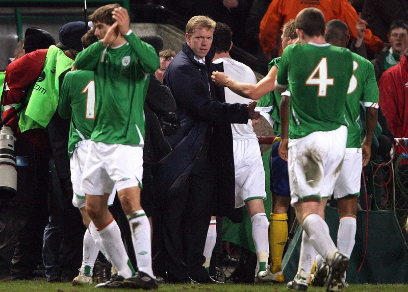 Steve Staunton congratulates his players as they leave the pitch