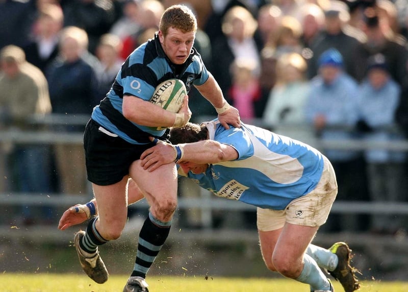 Seán Cronin goes past Garryowen's Rob Laffan