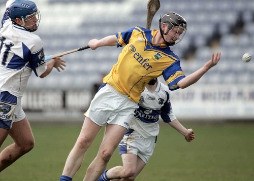 Eamonn Buckley of Tipperary attempts to pass the ball under pressure