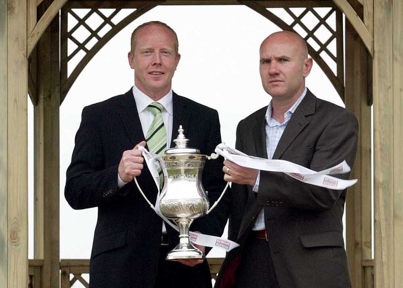 Cork City assistant manager Dave Hill (left) and Drogheda United Manager Paul Doolin with the Setanta Sports trophy