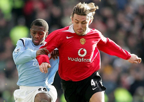 Gabriel Heinze has said he'll fight for his place at Old Trafford