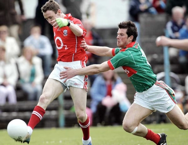 John Hayes tries to avoid Trevor Howley of Mayo in today's All-Ireland U-21 football final