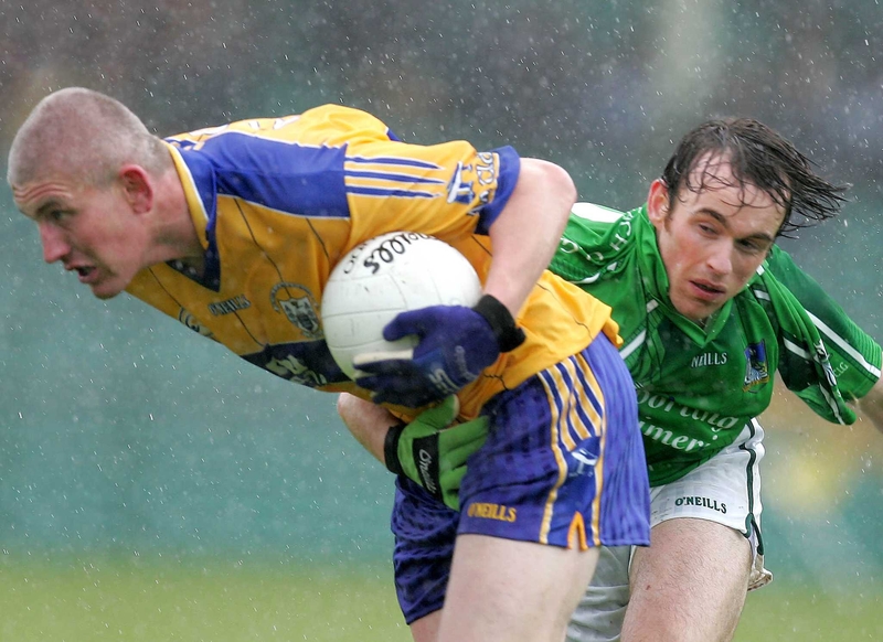 David Russell tries to escapes Limerick's Stephen Lavin