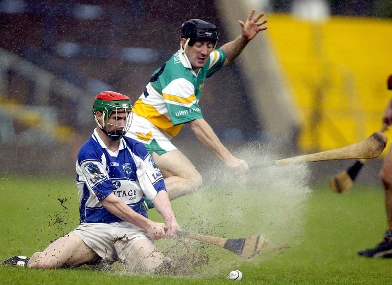 Brian Whelehan of Offaly challegnes Laois' John Delaney for the sliothar