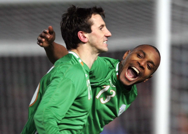 Liam Miller celebrates his wonderful goal against Sweden with Clinton Morrison