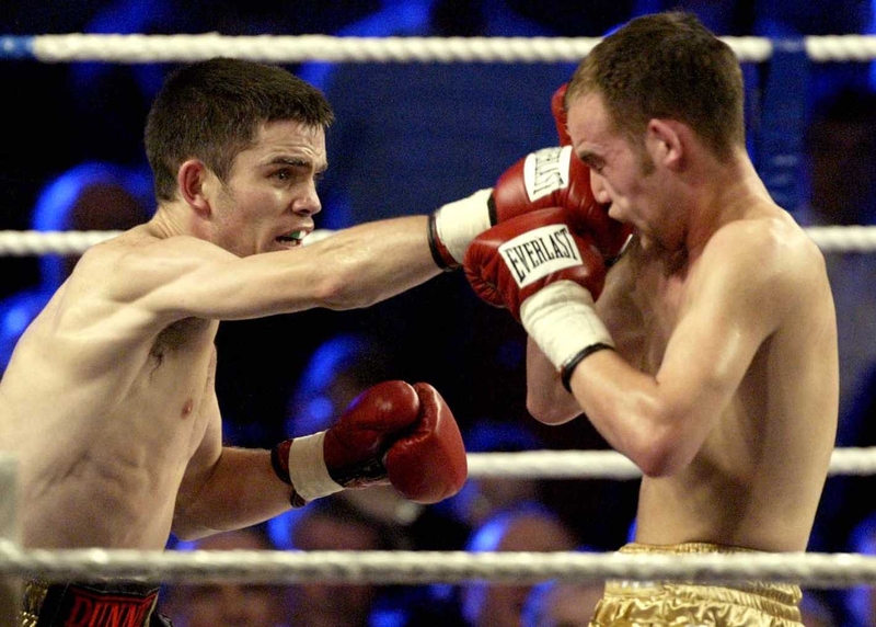Bernard Dunne jabs Sean Hughes during their bout last October
