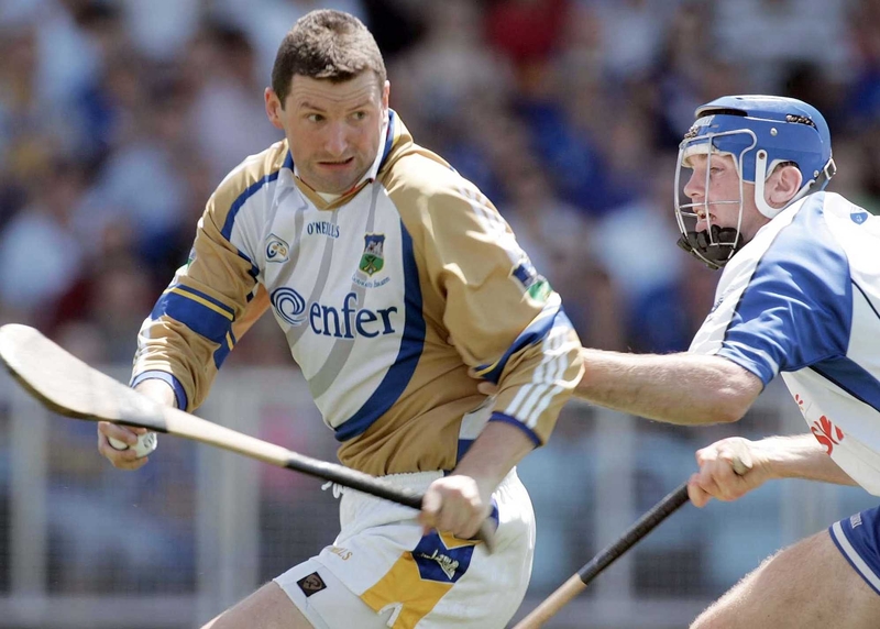 Tipperary's Brendan Cummins avoids Waterford's Michael Walsh