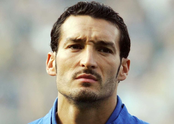 Gianluca Zambrotta must sit out Italy's opening game of the World Cup