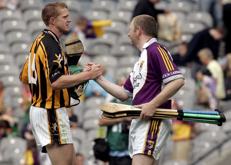 Kilkenny goalscorer Henry Shefflin is congratulated by Wexford 'keeper Damien Fitzhenry