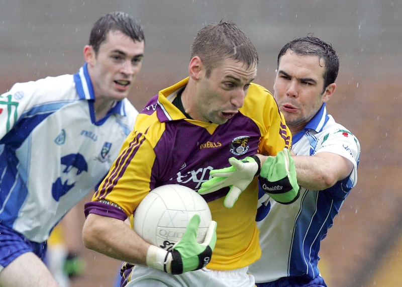 Matty Forde avoids the attention of the Monaghan defenders