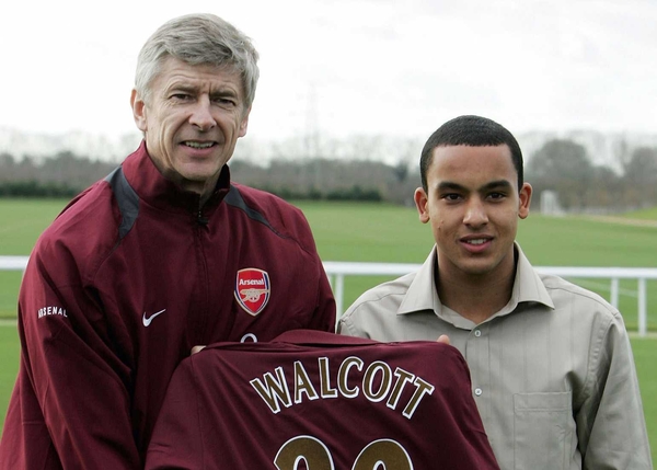 Theo Walcott could feature for Arsenal against Portsmouth