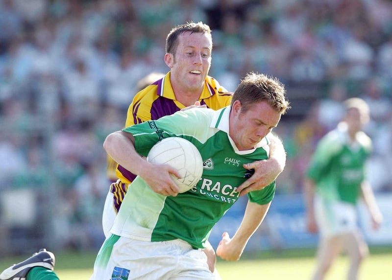 Mark Murphy of Fermanagh is tackled by Wexford's Paddy Colfer