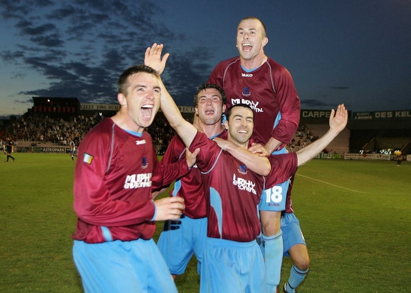 Drogheda players celebrate a famous victory
