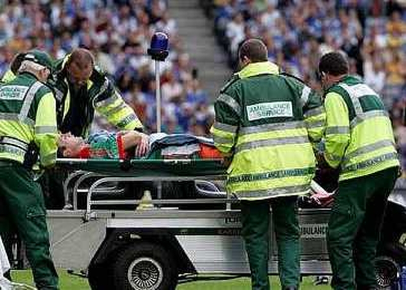 Mayo's Ronan McGarrity leaves the Croke Park field injured last Sunday