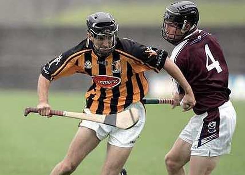 Kilkenny's Alan Healy tries to break away from Pat Holland of Galway