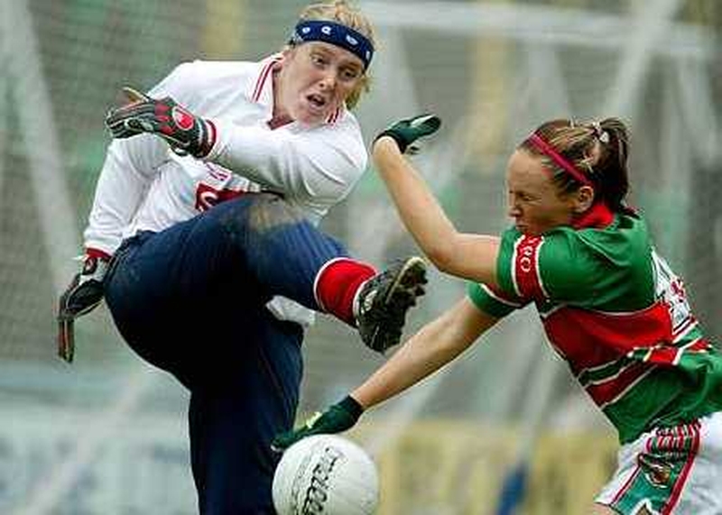 Cork goalkeeper Elaine Harte is put under pressure by Mayo's Triona McNicholas