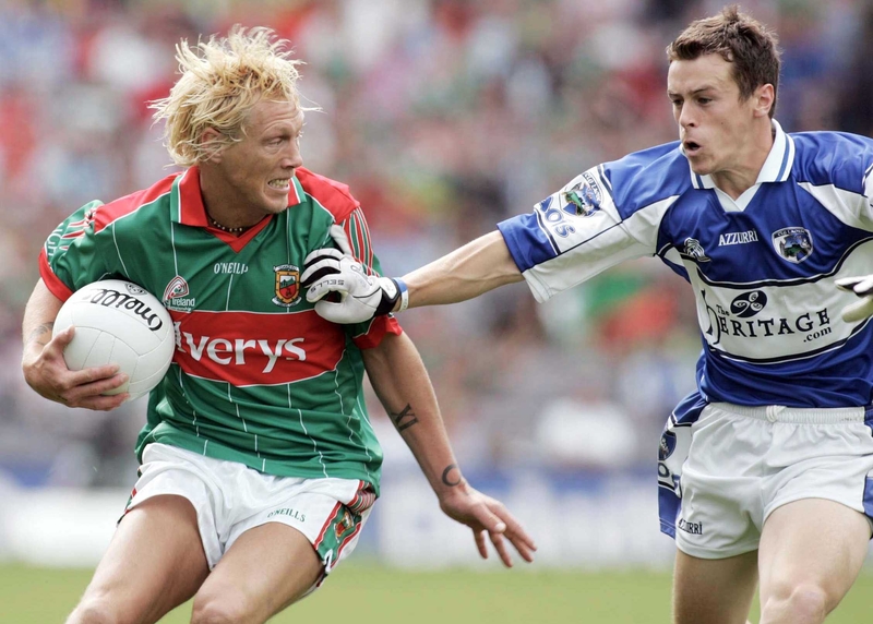 Mayo's Ciaran McDonald avoids Padraig McMahon of Laois