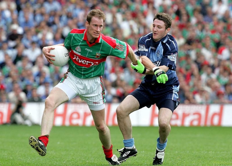 James Nallen holds off Dublin's Kevin Bonner in today's clash at Croke Park