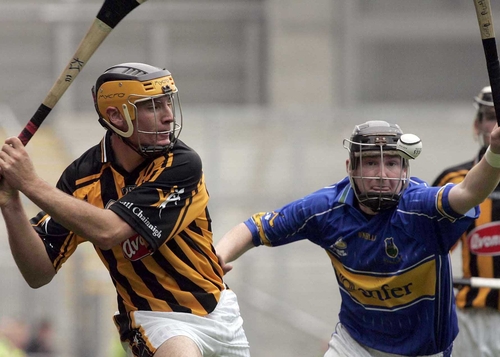 Kieran Joyce of Kilkenny clears whilst under pressure from Richie Ruth of Tipperary