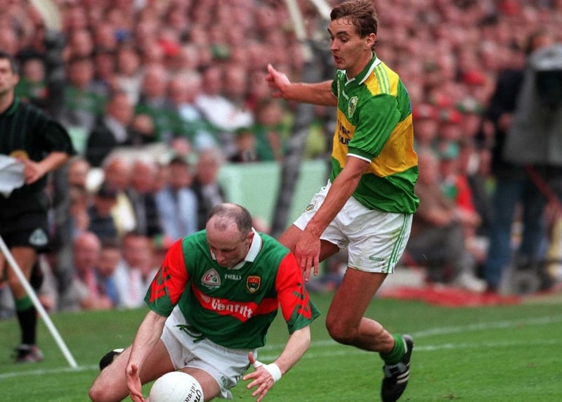 Mayo's Pat Holmes gathers the ball under pressure from Kerry's Maurice Fitzgerald in the 1997 All-Ireland SFC final