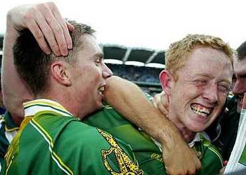 Marc Ó Sé (left) and Colm Cooper celebrate Kerry's facile victory in the 2004 All-Ireland final