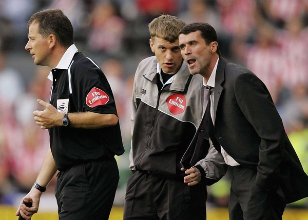 Roy Keane has a quiet word with a referee's assistant during a recent league match