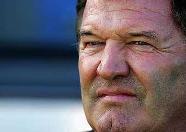 John Toshack has been assured that his job as Wales coach is not in jeopardy