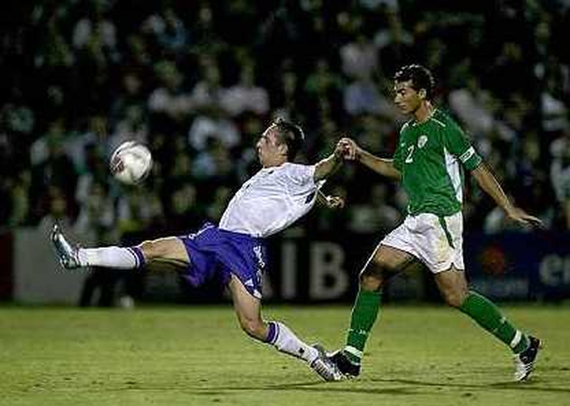 Franck Ribery tussles with Ireland's Stephen Kelly in a 2005 U-21 international
