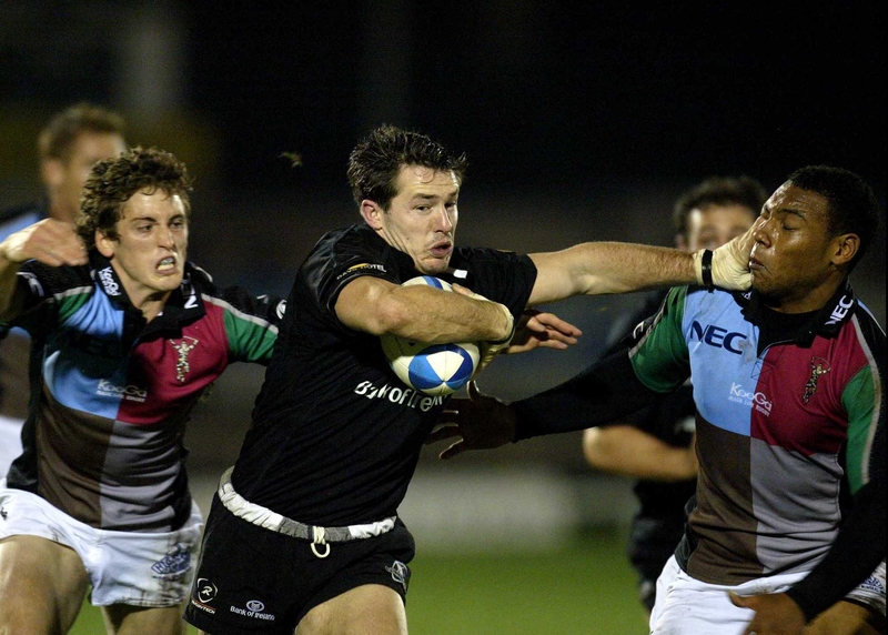 Connacht's Ted Robinson gets tackled by Jordan Turner Hall and Tom Williams of NEC Harlequins
