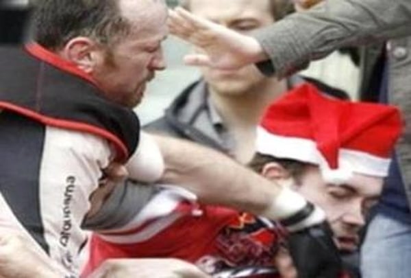 Trevor Brennan lands a punch on a supporter