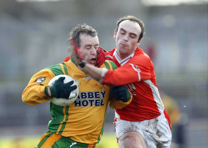 Donegal's Barry Monaghan tussles with Armagh's Malachy Mackin at Omagh