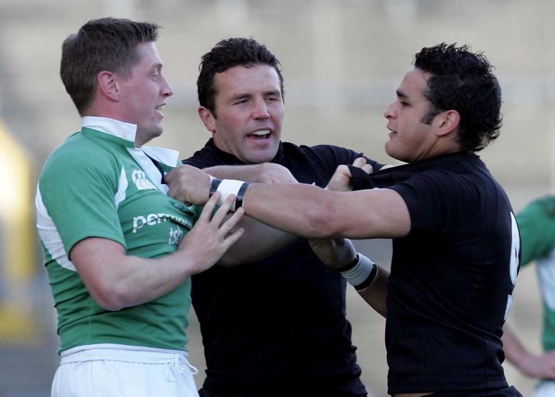 Piri Weepu (right) clashes with Ronan O'Gara in 2005