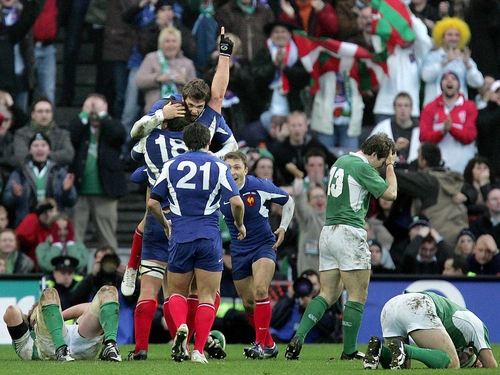 Jerome Thion hoists tryscorer Vincent Clerc aloft after scoring a late French winner