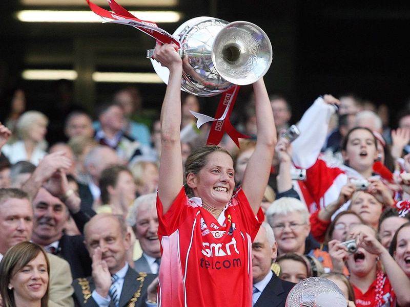 Mary O'Connor lifts the Ladies' 2006 All-Ireland senior championship cup after Cork defeated Tyrone