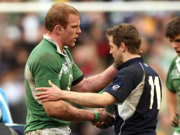 Paul O'Connell shakes the hand of Chris Paterson at the end of his involvement in this year's Championship