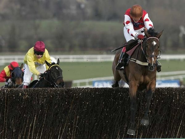 Robert Thornton jumps the last fence in the Arkle Trophy aboard My Way De Solzen