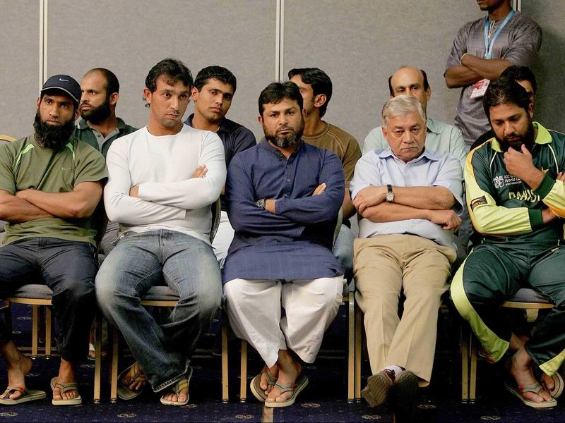 Members of the Pakistan team pay their respects at the memorial service