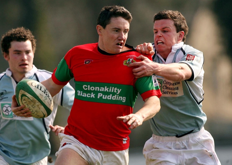 Garryowen scrum-half Gerry Hurley (right) gets to grips with Clonakilty's Shay O'Donovan