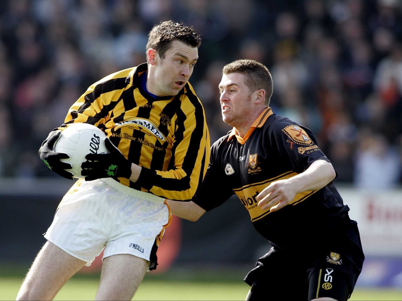 Keith Mahon and Oisín McConville tussle in the AIB All-Ireland club football final