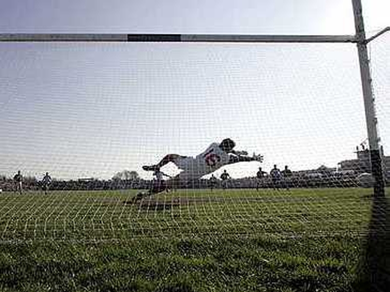 Diarmuid Connolly's late penalty bounces back off the Mayo post