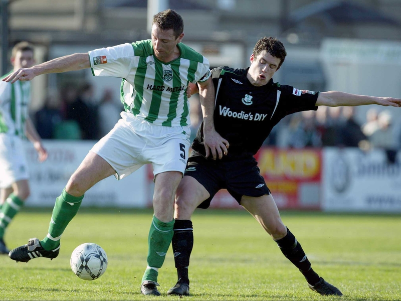 Bray's Clive Delaney and Tadgh Purcell of Shamrock Rovers