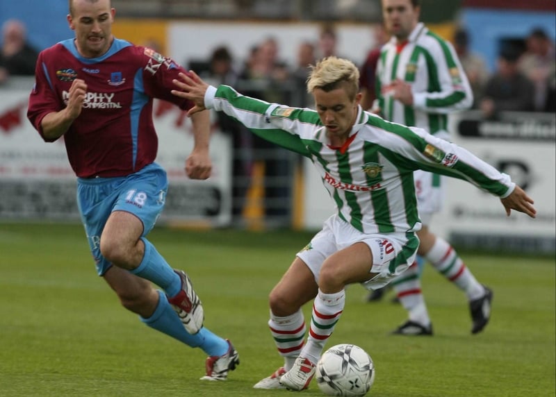 Liam Kearney of Cork City and Paul Keegan of Drogheda United battle for the ball in tonight's clash at United Park