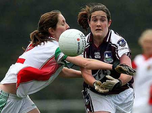 Mayo's Michelle Kelly gets a challenge in on Galway's Helen McHugh in today's league final at Hyde Park