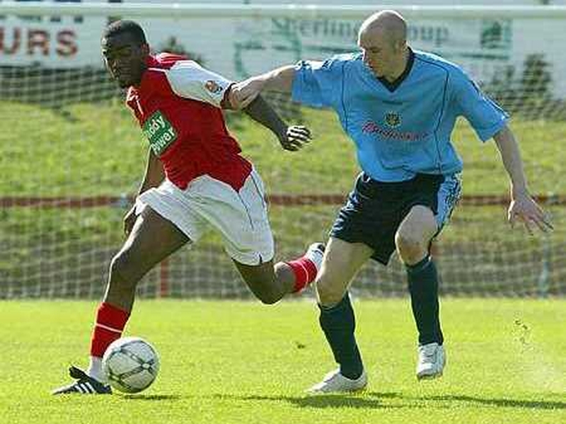 UCD goalscorer Conor Sammon attempts to dispossess Joseph Ndo